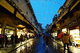 Florence_592_11212023 - Walking across the Ponte Vecchio in twilight under the rain
