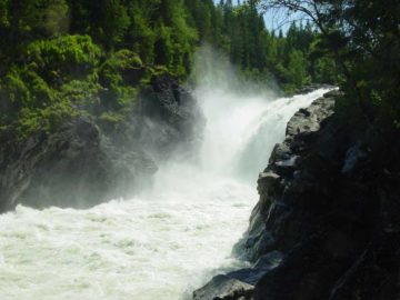 Formofossen was a powerful river waterfall on the Sanddøla River with a reported drop of 34m.  I doubted that the waterfall's main plunge was that tall based on what we were able to see, which the...
