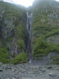 Franz_Josef_Glacier_Valley_060_11222004 - A waterfall in a notch near the terminus of Franz Josef Glacier