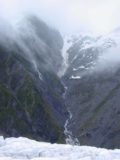 Franz_Josef_helihike_086_11222004 - Looking towards another series of waterfalls spilling towards the Franz Josef Glacier