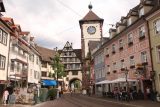 Freiburg_129_06212018 - Closer look at the clock tower and gate in Freiburg im Breisgau