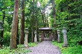 Fudo_Falls_042_07192023 - Continuing towards another archway past some more lamp pillars en route to the Fudo Falls beyond the Sakuramatsu Shrine