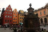 Gamla_Stan_284_06142019 - Another look of the fountain fronting some colorful buildings in Stortorget of Gamla Stan