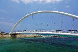 Gangmun_Beach_008_06132023 - Looking across a bridge over some blue-green waters at Gangmun Beach