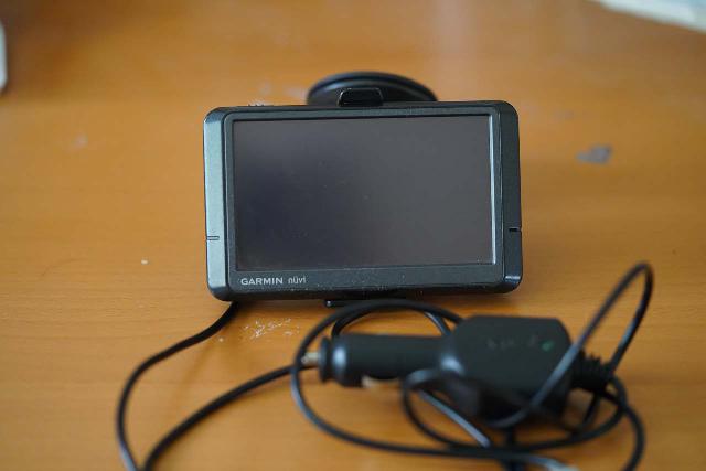 Our trusty Garmin Nuvi 265W auto GPS navigation unit, which has served us since 2007-2008 and continues to run well to this day!