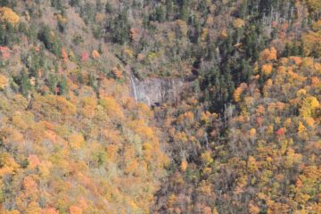 Glassmine Falls is a thin waterfall seen right off the Blue Ridge Parkway.  It's said to be ephemeral and we can see why even though we saw it flowing. There's a sign by the car park for the...