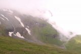 Grossglockner_064_07112018 - Looking towards some stringy cascade amongst the patches of snow and clouds along the Grossglockner Road