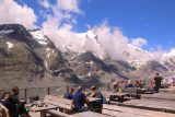Grossglockner_359_07122018 - Looking across the outdoor seating area with the cloud-shrouded Grossglockner Peak in the background