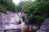 Guryong_205_06132023 - Broad look at the main tiers of the Guryong Falls fronted by orange buoys