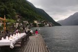 Hallstatt_673_07052018 - Tahia checking out the lakeside dining tables and some curious swan at the Seehotel Gruner Baum in Hallstatt