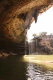 Hamilton_Pool_102_03122016 - Within the grotto looking beneath some stalactites towards the Hamilton Pool waterfall