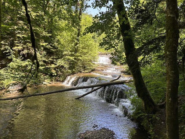 Herisson_188_iPhone_14_06172025 - Looking upstream at a couple of tiers of waterfalls fronting the Chateau Garnier in June 2025