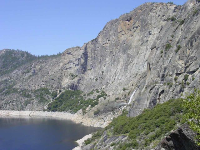 Hetch_Hetchy_hike_058_04242004 - When Tueeuala Falls has low flow, the footbridges beneath Wapama Falls would be a cake walk, but if Tueeulala Falls has high flow, then you have to prepare to get really wet or even turn back