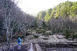 Hirayu_Otaki_017_04122023 - Julie starting to walk on the garden area on the way up to the Hirayu Falls