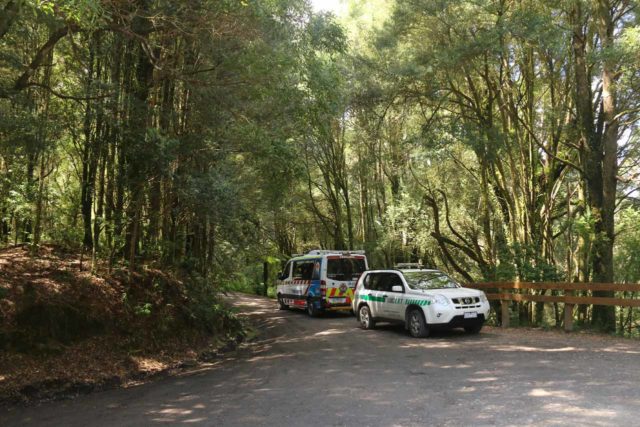 Emergency vehicles showing up at a trailhead in Australia where we saw a woman break an ankle on the trail and couldn't move