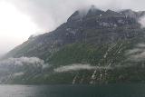 Hurtigruten_day2_235_06302019 - Lots of waterfalls coming down tall mountains in Geirangerfjorden