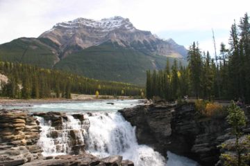 Athabasca Falls was memorable to us because it featured a pretty mountain backdrop.  The falls itself wasn't particularly mindblowing, but it possessed enough power to carve out a bit of a gorge...