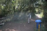 Iguazu_Falls_762_09022007 - Julie passing by a rubbish bin by the Sendero Macuco