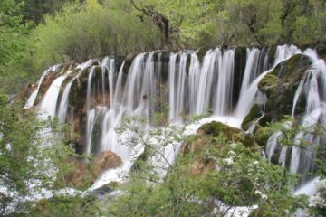 The Shuzheng Waterfall may not have the width and size of its more famous counterparts like Nuorilang Waterfall and Pearl Shoal Waterfall, but it certainly has the grace and beauty that...
