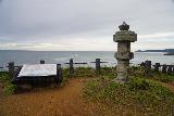 Juroku_Rakan_Iwa_019_07082023 - Context of the rip current in the distance fronted by a lookout and interpretive sign at the Juroku Rakan Iwa site north of Sakata