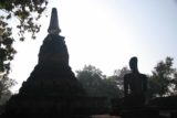 Kamphaeng_Phet_014_01052009 - An alien-looking Buddha checking out a chedi