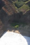Kauai_Inter_Island_heli_321_12272006 - A waterfall by the Honomu Sea Arch; are you kidding me?