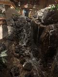Keokis_Paradise_007_iPhone_11202021 - Checking out the waterfall inside Keoki's Paradise