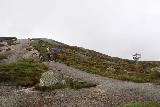 Kjerag_016_06222019 - Starting up the Kjerag Trail with slippery granite and ominous skies still around