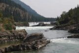 Kootenai_Falls_097_08052017 - Looking upstream from a somewhat unsanctioned spot towards some downstream rapids leading up to the main drop of Kootenai Falls in the background