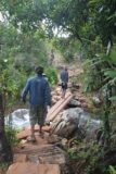 Kundalila_Falls_007_05272008 - Following the local guide across a narrow makeshift bridge en route to Kundalila Falls
