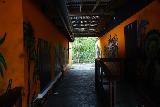 La_Piedra_Escrita_003_04192022 - Looking through a corridor in what seemed like an abandoned restaurant that obscured La Piedra Escrita