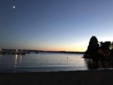 Lake_Washington_17_002_iPhone_07292017 - Moon over calm waters at twilight on the shores of Lake Washington