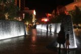 Las_Vegas_17_048_04212017 - During our stroll along the Vegas strip, Tahia noticed this lit up wall fountain that she very much wanted to be around and touch the water