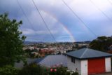 Launceston_17_049_11242017 - Context of some homes on the hills adjacent to Cataract Gorge looking towards a double rainbow over the city of Launceston