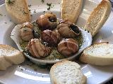 Le_Table_de_Sophie_004_iPhone_02042023 - Closeup look at the very nice escargot dish, which we got two of knowing that we'd be devouring it at Le Table de Sophie in Westwood