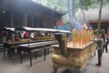 Leshan_127_04282009 - Burning incense near some shrines at the Grand Buddha site