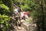 Lewis_Falls_17_042_06102017 - The family engaged in a bit of a bouldering and deadfall scramble en route to Soldier Creek Falls during our June 2017 visit