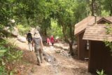 Lewis_Falls_17_173_06102017 - The family passing by the intact cabin along the Soldier Creek Falls hike as we were headed back the other way in June 2017