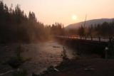 Lewis_Falls_Yellowstone_012_08112017 - Looking downstream towards the rising sun over the Lewis River Bridge