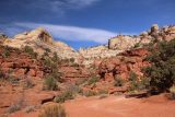 Lower_Calf_Creek_Falls_18_041_04022018 - Looking towards a mix of red sandstone cliffs topped off by a more white sandstone layer as seen throughout the Lower Calf Creek Falls hike during our April 2018 visit