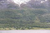 Lyngen_Alps_175_07042019 - An ephemeral waterfall tumbling behind the town of Svensby as the ferry was about to land