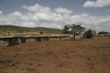 Maasai_Mara_013_06222008 - The Maasai houses with cattle park