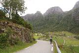 Manafossen_175_06222019 - Sharing the narrow road with a bicyclist making way through the valley at the head of Frafjorden