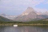 Many_Glacier_Hotel_067_08072017 - Context of the boat on Swiftcurrent Lake fronting Mt Wilbur and the Iceberg Notch