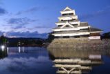 Matsumoto_057_10192016 - The lit up Matsumoto Castle reflected in the moat with some fading light in the background