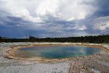 Midway_Geyser_Basin_139_08032020 - Looking across what I think is the Opal Pool with very dark clouds closing in on us fast at the Midway Geyser Basin