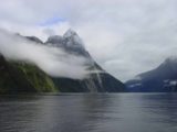 Milford_Sound_033_11302004 - Looking towards Mitre Peak starting to show itself from some low clouds clinging to the mountains of Milford Sound during our late December 2009 Milford Sound Cruise