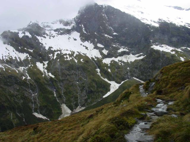 Milford_Track_day3_064_11282004 - Descending into the Arthur Valley side of the Milford Track with many waterfalls and some snow coming down