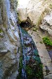 Millard_Falls_044_06092020 - Looking up at the top of Millard Falls and the boulder wedged at its brink
