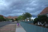 Moab_006_04202017 - Julie and Tahia walking towards the 98 Center Restaurant in Moab as the storm was in the process of clearing